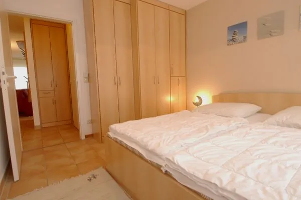 Schalfzimmer mit Doppelbett Residenz am Strand Wohnung 4-58