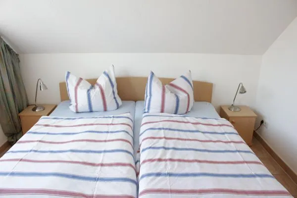 Schalfzimmer mit Doppelbett Residenz am Strand Wohnung 4-64