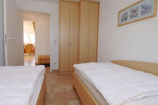 Schlafzimmer mti Einzelbetten Residenz am Strand Wohnung 5-71