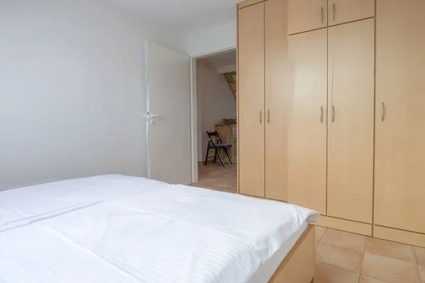 Schlafzimmer mit Doppelbett Residenz am Strand Wohnung 6-82