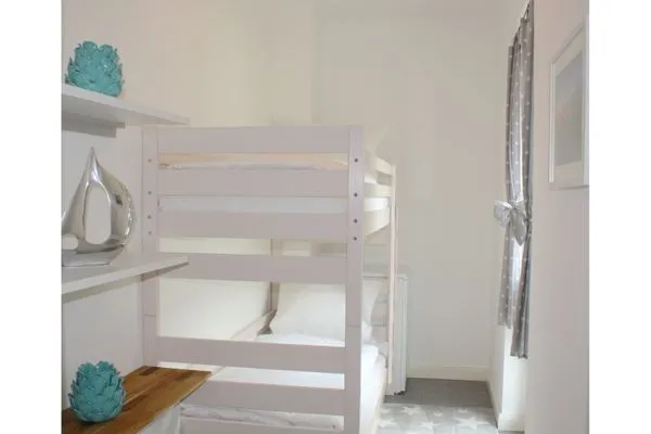 Schlafzimmer mit Etagenbett Logierhaus Friedrich WE 01 - "Beachhouse No.1"