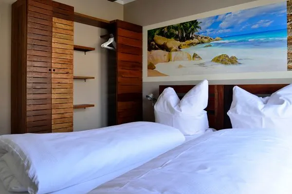 Schlafzimmer  Typ B1 Ferienhaus - Pukalani