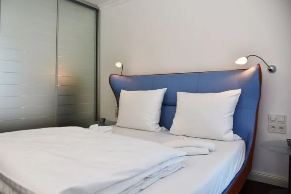 Schlafzimmer mit Doppelbett Logierhaus Friedrich WE 13 - "Bernsteinglück"