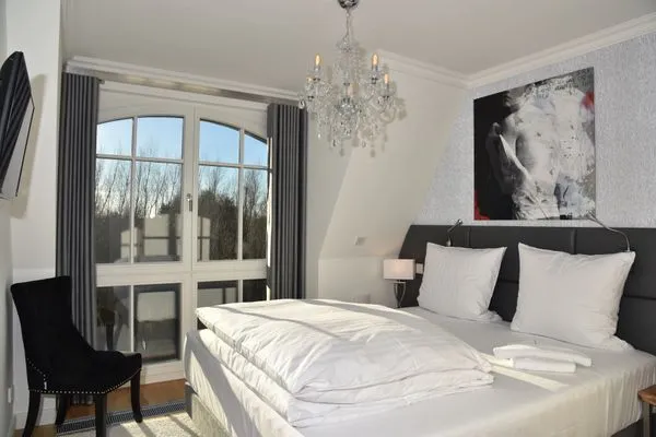 Schlafzimmer mit Doppelbett Logierhaus Friedrich WE 19 - "Weststrand"