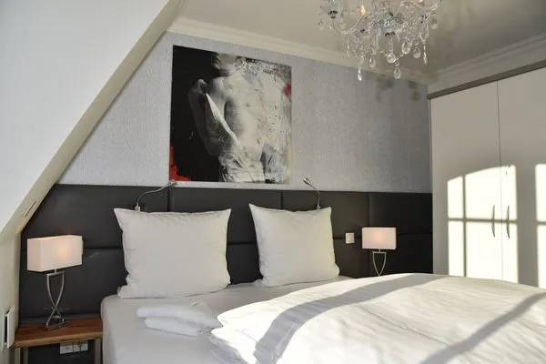 Schlafzimmer mit Doppelbett Logierhaus Friedrich WE 19 - "Weststrand"