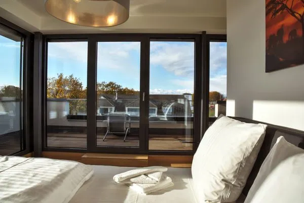 Schlafzimmer mit Doppelbett Logierhaus Friedrich WE 22 - "Sandstrand"