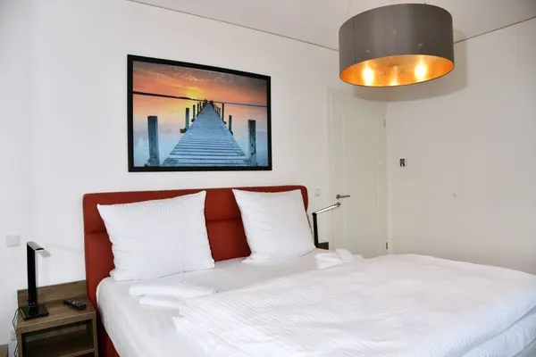 Schlafzimmer mit Doppelbett Logierhaus Friedrich WE 24 - "Sandläufer"