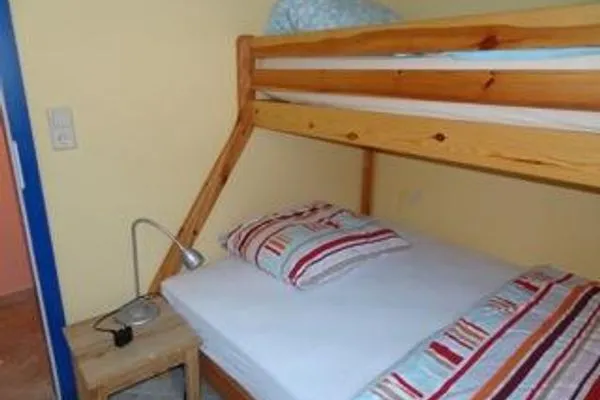 Schlafzimmer Ferienhaus Under de Diek Ferienwohnung 7