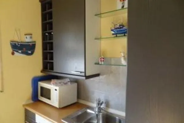 Küche / Küchenzeile Ferienhaus Under de Diek Ferienwohnung 7