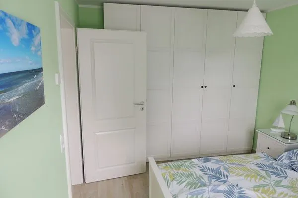 Schlafzimmer mit Doppelbett Kavelweg 13 Kavelweg 13 Wohnung 1 - Strandrefugium