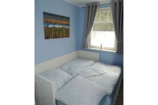 Schlafzimmer mit Ausziehbarem Bett Kavelweg 13 Kavelweg 13 Wohnung 1 - Strandrefugium