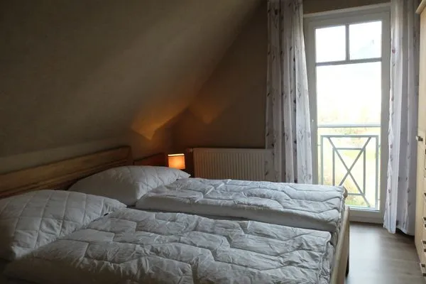 Schlafzimmer mit Doppelbett Zur Hanse Wohnung 4.5 - Zur Hanse West