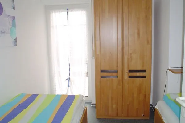 Schlafzimmer mit zwei Einzelbetten Parkresidenz am Hafen Wohnung HF 32