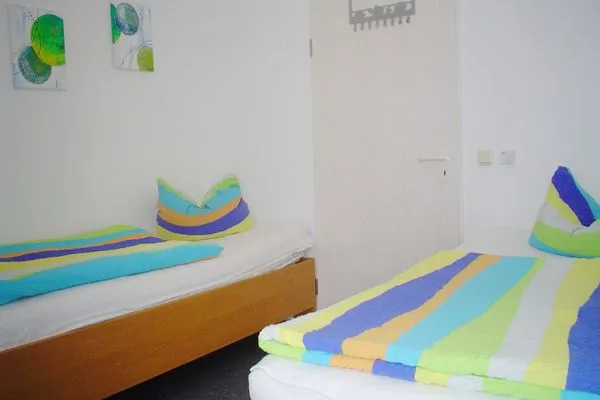 Schlafzimmer mit zwei Einzelbetten Parkresidenz am Hafen Wohnung HF 32