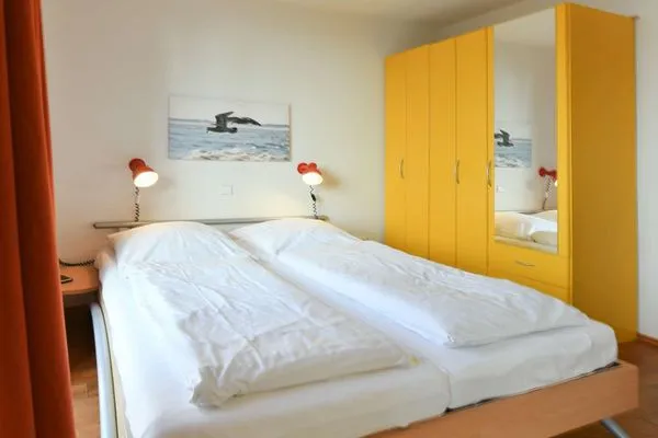 Schlafzimmer Haus Dünenblick Ferienwohnung 23