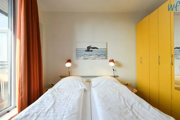 Schlafzimmer Haus Dünenblick Ferienwohnung 23