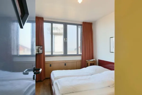 Schlafzimmer Haus Dünenblick Ferienwohnung 23