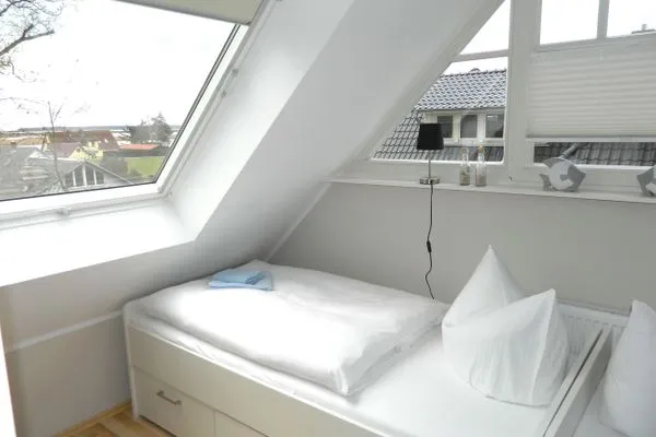 Schlafzimmer mit zwei Einzelbetten  Haus Frieda