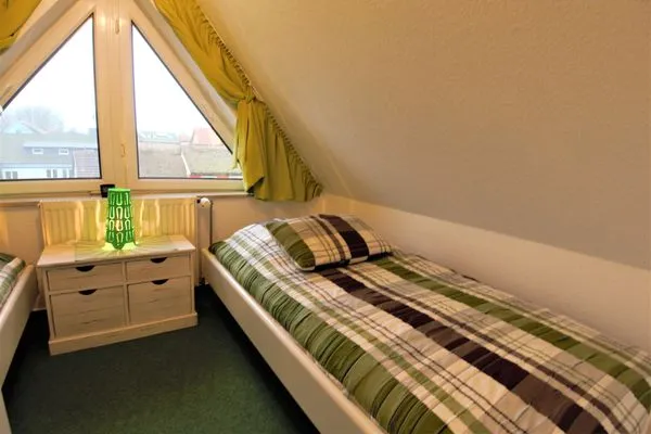 Schlafzimmer mit zwei Einzelbetten  Ferienwohnung Jonathan
