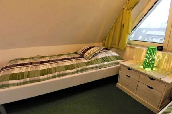 Schlafzimmer mit zwei Einzelbetten  Ferienwohnung Jonathan