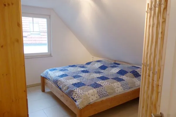 Schlafzimmer mit Doppelbett Hafenstrasse 15 in Prerow Kieckut in Prerow