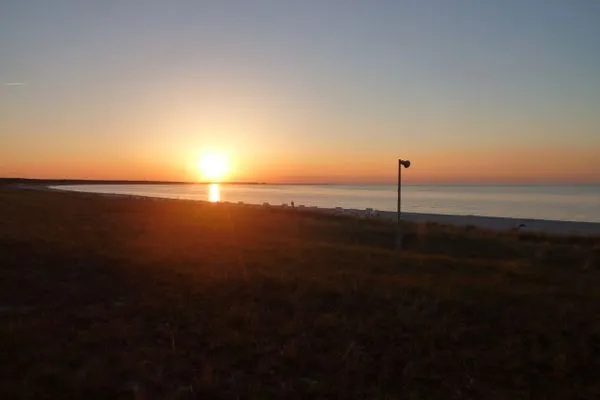 Sonnenuntergang Hafenstrasse 15 in Prerow Wolkenglanz in Prerow