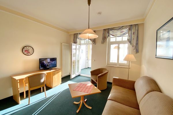 Wohnzimmer mit Schlafsofa
