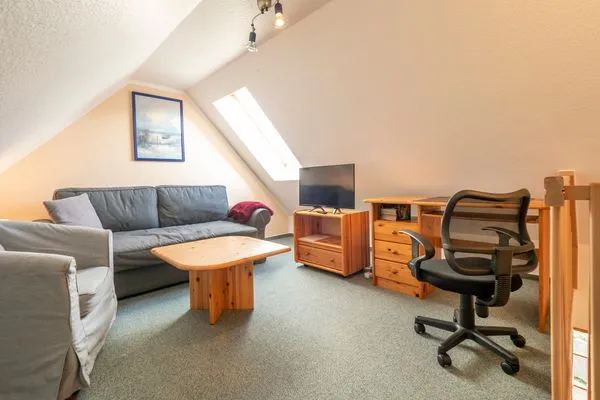 Aufenthaltsbereich im DG Ferienpark Freesenbruch Wohnung 4.6 - Boddenblick