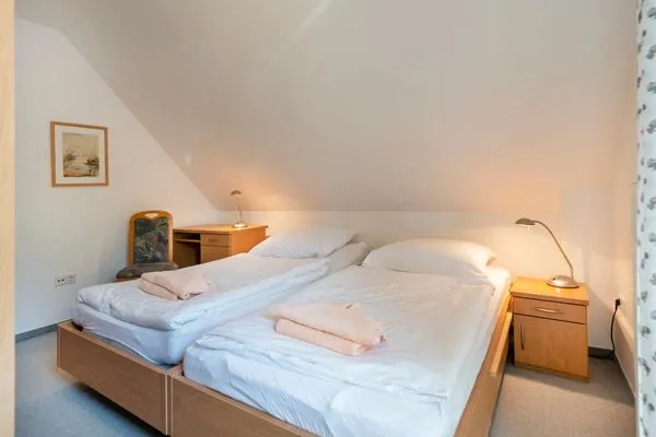 Schlafzimmer mit Doppelbett Ferienpark Freesenbruch Doppelhaushälfte 10 - Lieblingsplatz