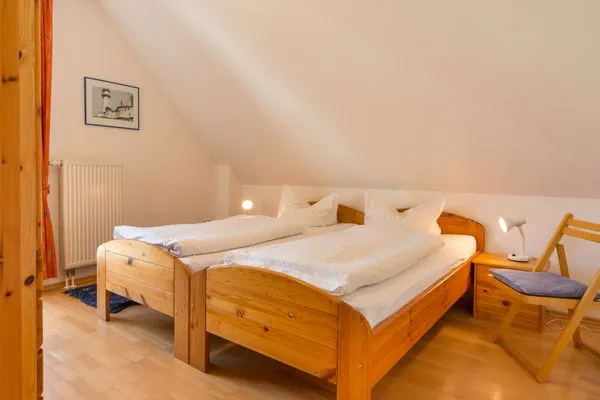 Schlafzimmer mit zwei Einzelbetten Ferienpark Freesenbruch Doppelhaushälfte 10a - Meeresbrise