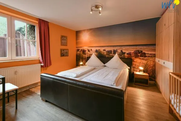 Schlafzimmer Haus Dünenrose Ferienwohnung Klabautermann