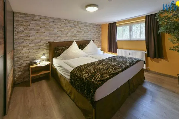 Schlafzimmer Haus Dünenrose Ferienwohnung Klabautermann