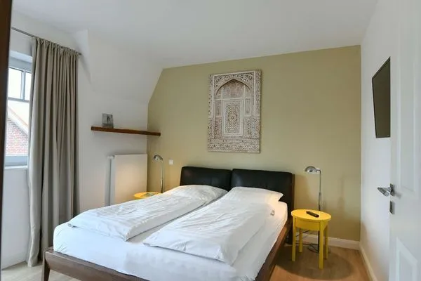 Schlafzimmer Kapitänshaus Ferienwohnung 11