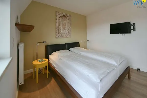 Schlafzimmer Kapitänshaus Ferienwohnung 11