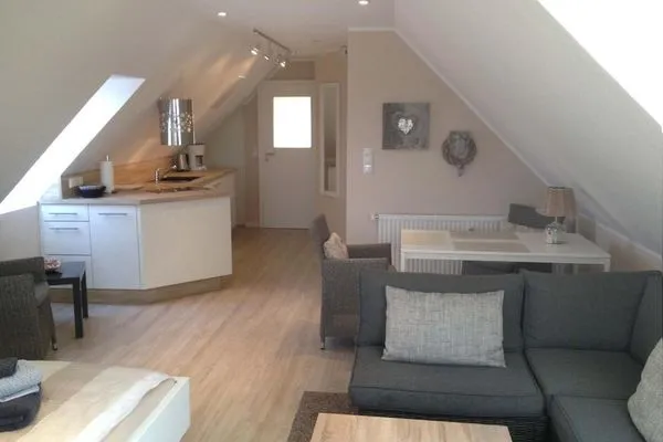 Wohnzimmer Ferienhaus Greune-Stee-Weg 39 Ferienwohnung Südstrandoase