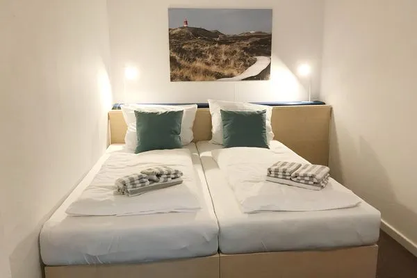 Schlafzimmer im Bungalow Frisia 1 in Norddorf auf Amrum Haus Frisia Bungalow Frisia 1