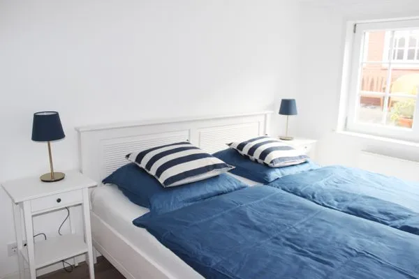 Schlafzimmer 1 in der Ferienwohnung Frisia 3 in Norddorf auf Amrum Haus Frisia Ferienwohnung Frisia 3