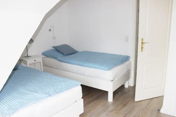 Schlafzimmer 1 in der Ferienwohnung Frisia 5 in Norddorf auf Amrum Haus Frisia Ferienwohnung Frisia 5