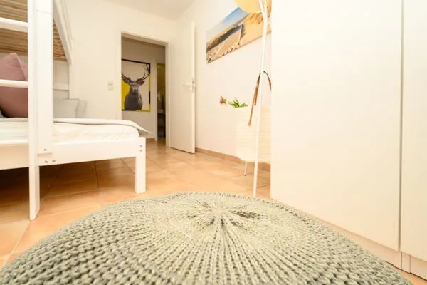 Schlafzimmer mit Hochbett Residenz am Strand Deichpoofe -  Wohnung 1-06