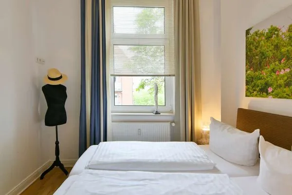 Schlafzimmer Haus Inselrose Ferienwohnung Wildrose