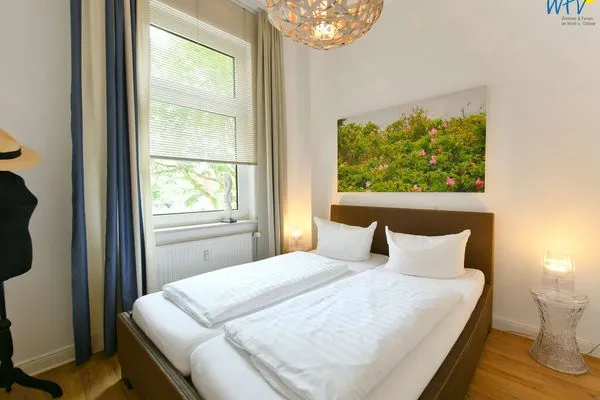 Schlafzimmer Haus Inselrose Ferienwohnung Wildrose