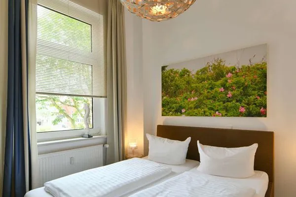 Schlafzimmer Haus Inselrose Ferienwohnung Wildrose