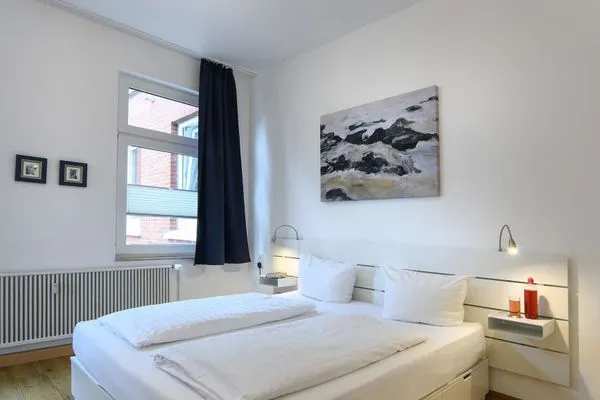 Schlafzimmer Haus Inselrose Ferienwohnung Dünenröschen