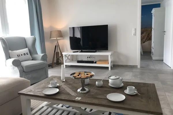 Wohnzimmer Haus *Weiße Düne* Ferienwohnung *Weiße Düne 3 / OceanView*