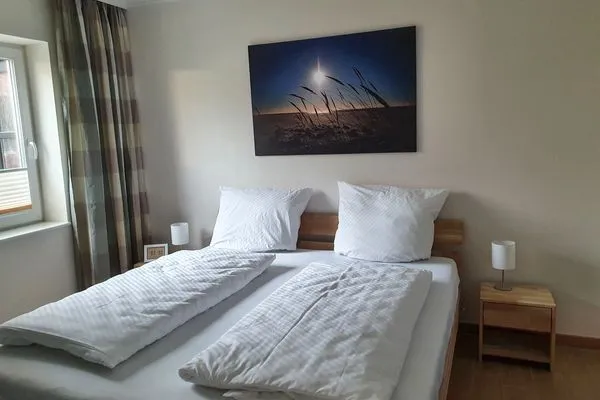 Schlafzimmer in der Ferienwohnung Passat im Haus Kap Hoorn in Wittdün auf Amrum Haus Kap Hoorn Ferienwohnung Passat