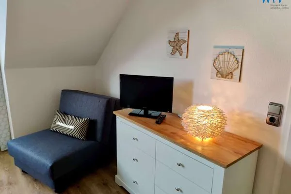 Einzelschlafsofa zum ausklappen im Schlafzimmer Residenz am Rosengarten Ferienwohnung Atempause