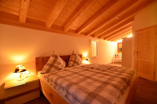 Schlafzimmer  Eulennest - Feriendorf Via Claudia Haus 81