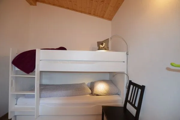 Schlafzimmer  Alpenliebe - Feriendorf Via Claudia Haus 58