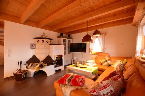 Wohnzimmer  Berg- und Seetraum - Feriendorf Via Claudia Haus 64