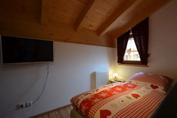 Schlafzimmer  Berg- und Seetraum - Feriendorf Via Claudia Haus 64